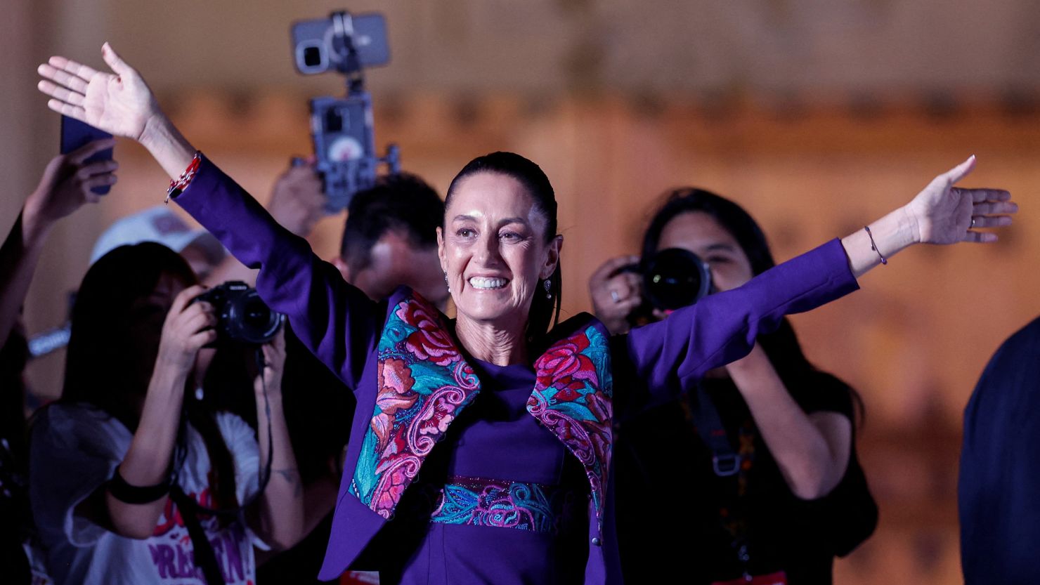 Claudia Sheinbaum waves at supporters in the Zocalo plaza in Mexico City, Mexico on  June 3, 2024.
